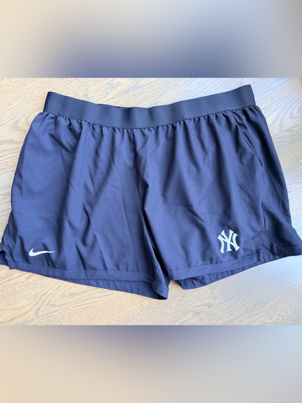 Nike black woman’s Athletic Shorts with White Logos